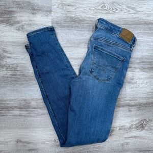 American Eagle Jeggings Size 0 25W Low Rise Medium Wash Distressed‎ Jeans